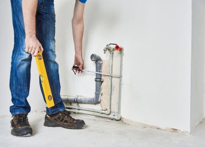 plumber-checks-pipe-vertical-level-after-installat-2023-11-27-05-11-53-utc-qovajk6xo1uarac0ouxs79mj5v677s57c27ef2jamg-min Leak Detection and Repair Photo